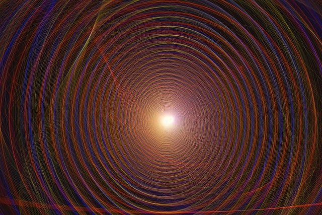 artistic image of swirling colours into the centre of a circle